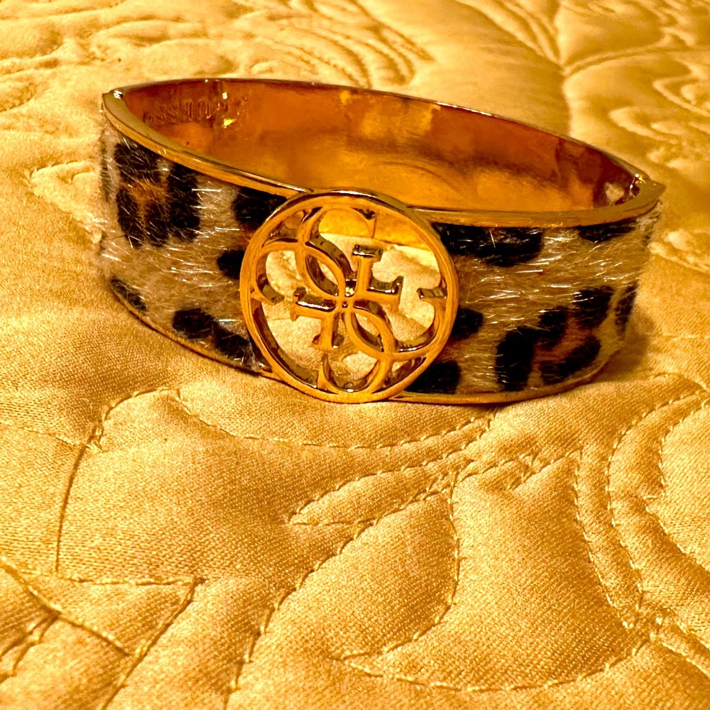 Beautiful, cuff bracelet - gold and leopard print with a texture of fur.